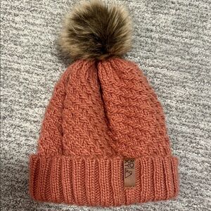 Roxy Woman’s Burnt Orange Cable-Knit Pom Beanie